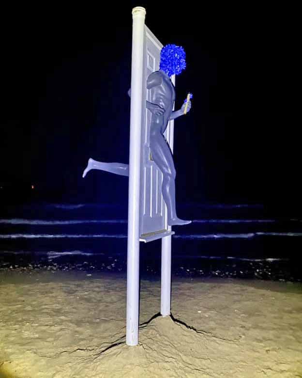 Custodians art sculpture at Sheps Hollow at night