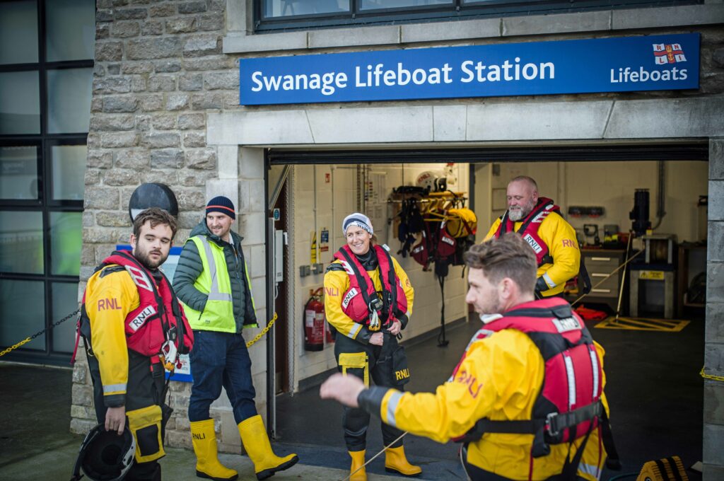 Lifeboat crew at Swanage boathouse