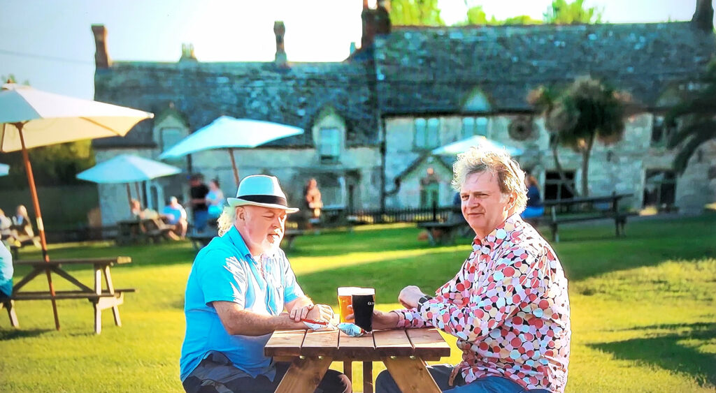 Bill Bailey and Paul Merton stopped for a pint at the Square and Compass in Worth Matravers while filming their latest TV show