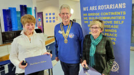 Cancare founders Vicki Fooks and Gill Norman receive Paul Harris Fellow awards from Swanage and Purbeck Rotary President Chris LeFevre